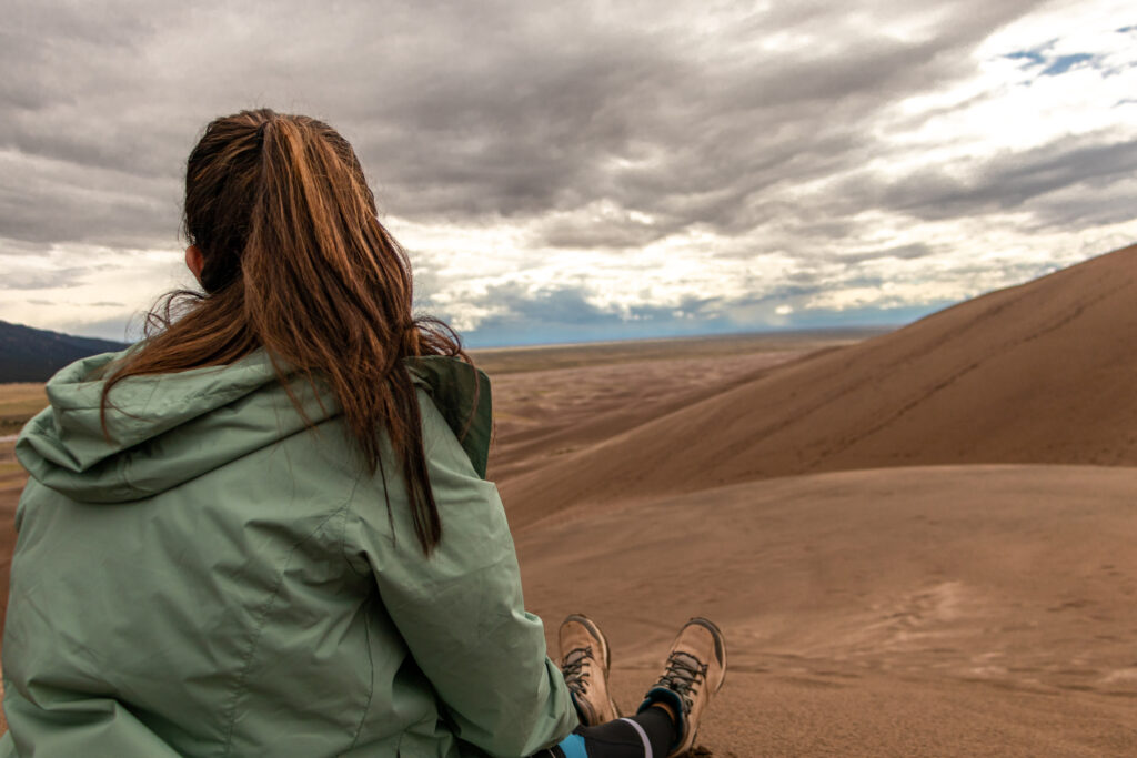 Me looking out at the sand dunes